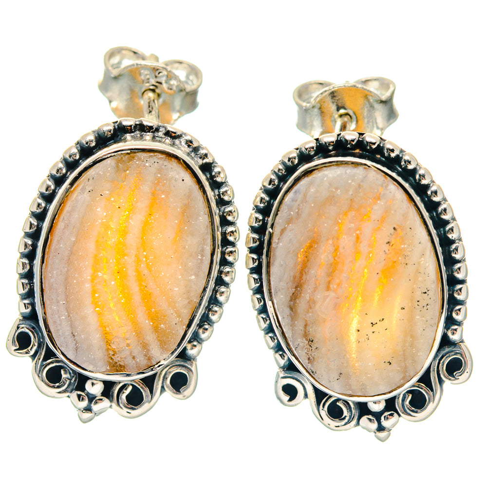 Oval light peach agate stud earrings in 925 sterling silver lace-style bezel