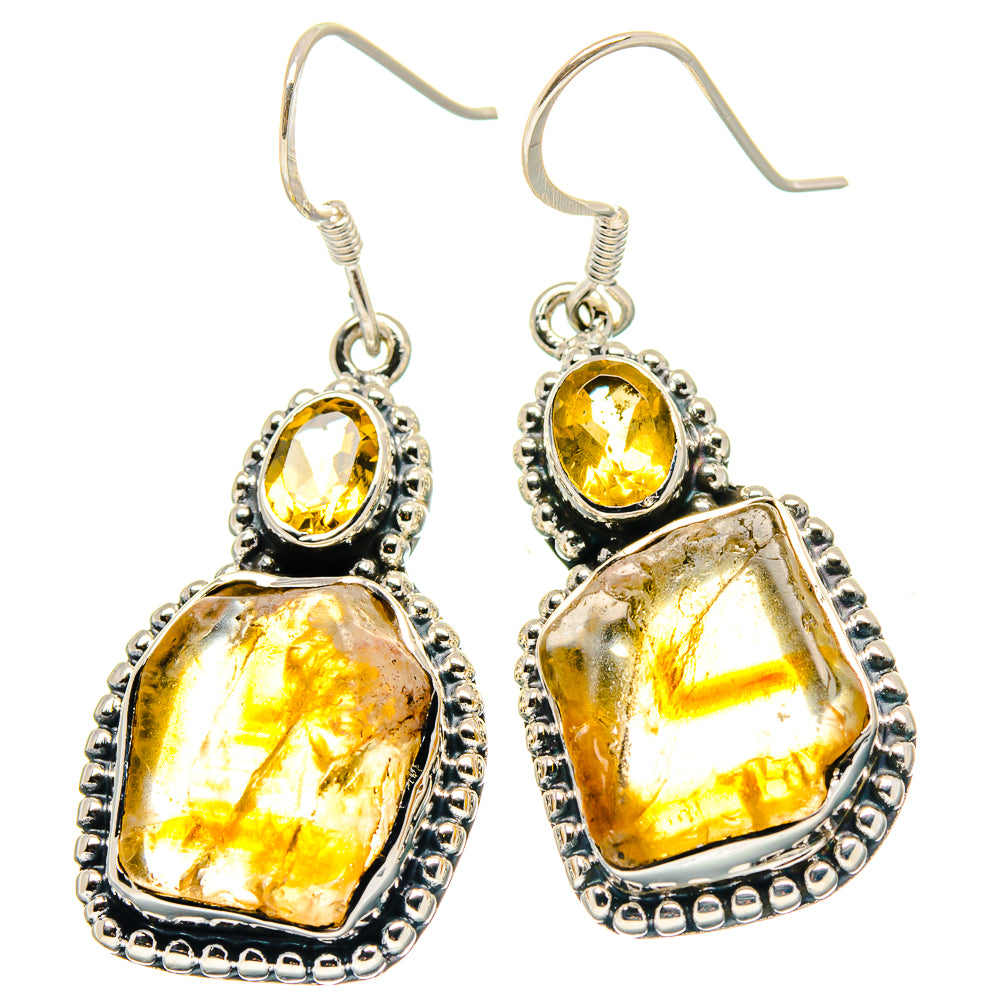 Sterling silver dangle earrings with rough yellow citrine teardrop and oval stones