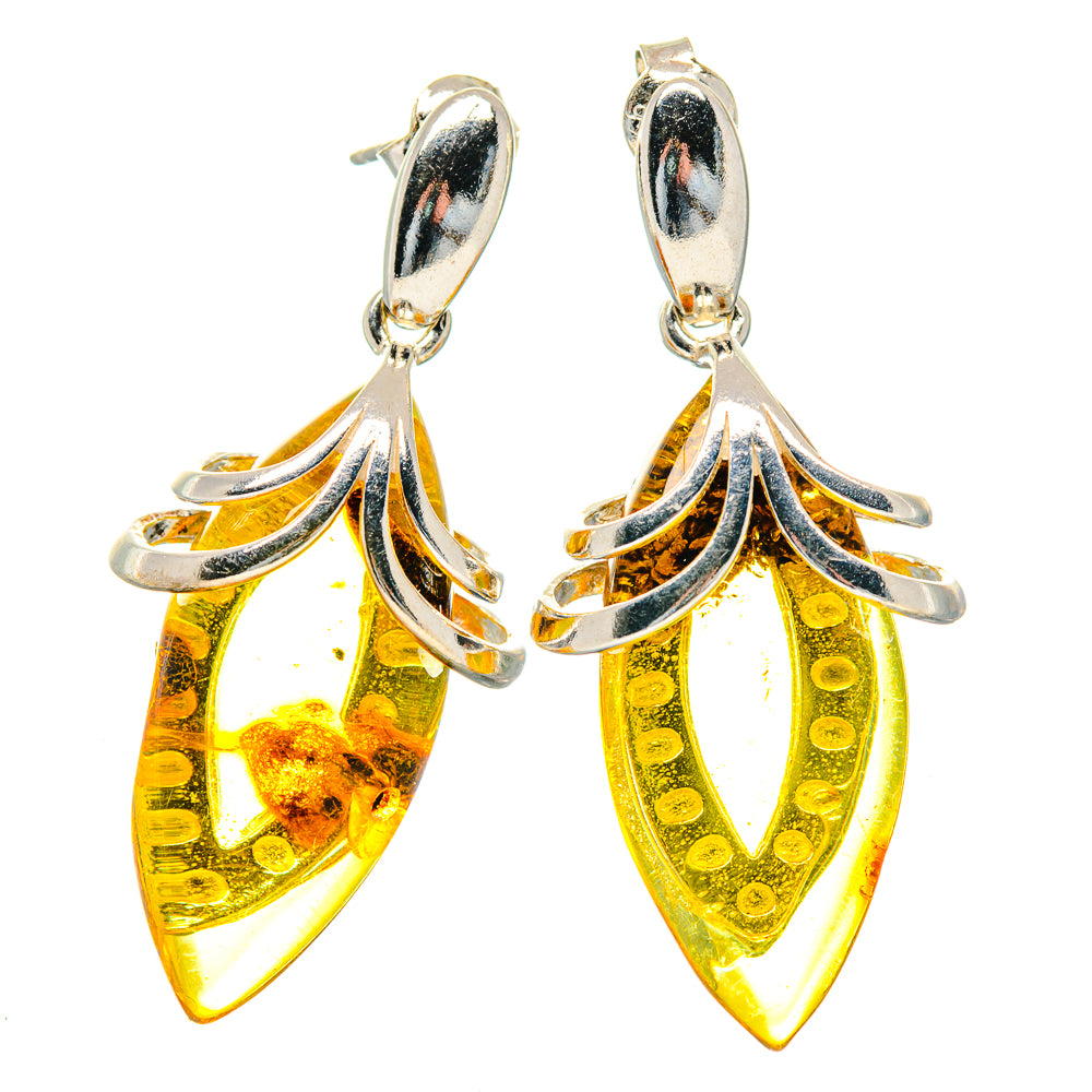 Sterling silver citrine drop earrings with amber yellow teardrop stones, hinged hoops