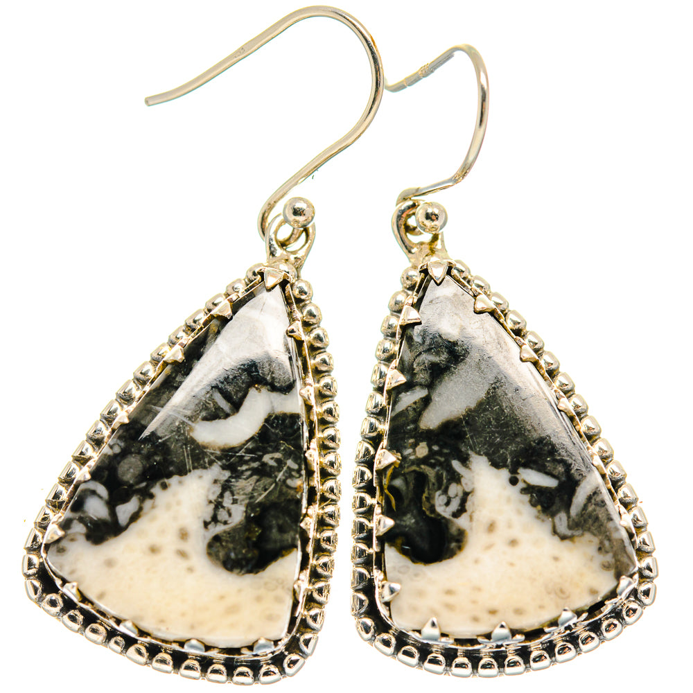 Sterling silver teardrop earrings with black-and-white stone and ornate bead border