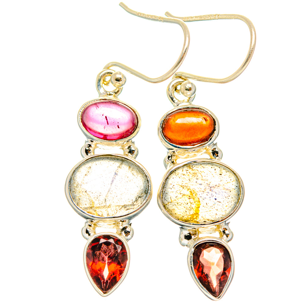 Silver drop earrings with pink and orange ovals, yellow discs, and red teardrop stones
