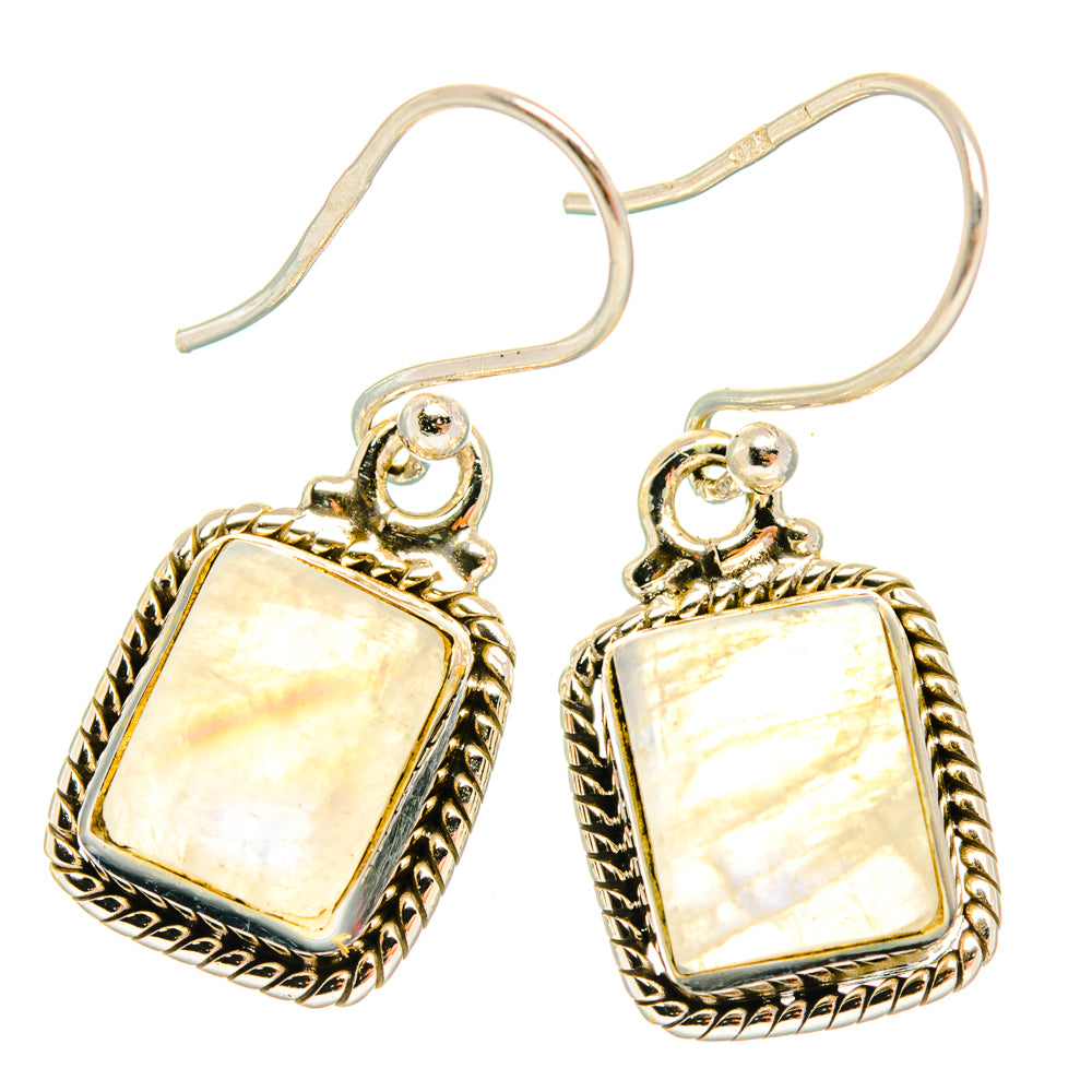 Square moonstone earrings with ornate gold-tone bezels and silver hook backs