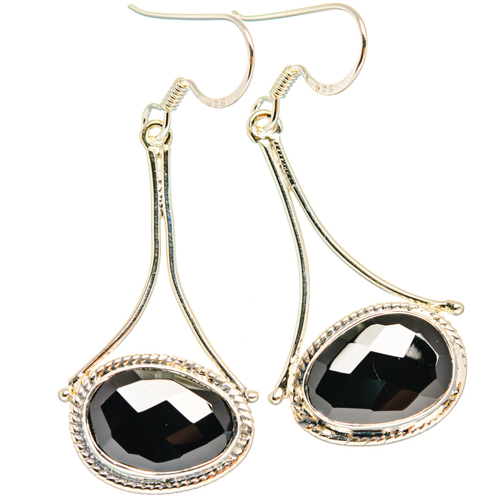 Sterling silver drop earrings with black faceted onyx teardrop stones, halo setting