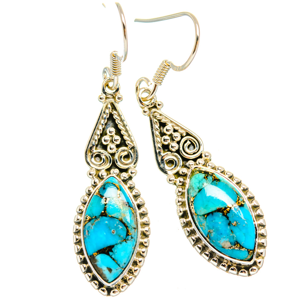 Turquoise teardrop dangling earrings with ornate silver-tone filigree and hook backs