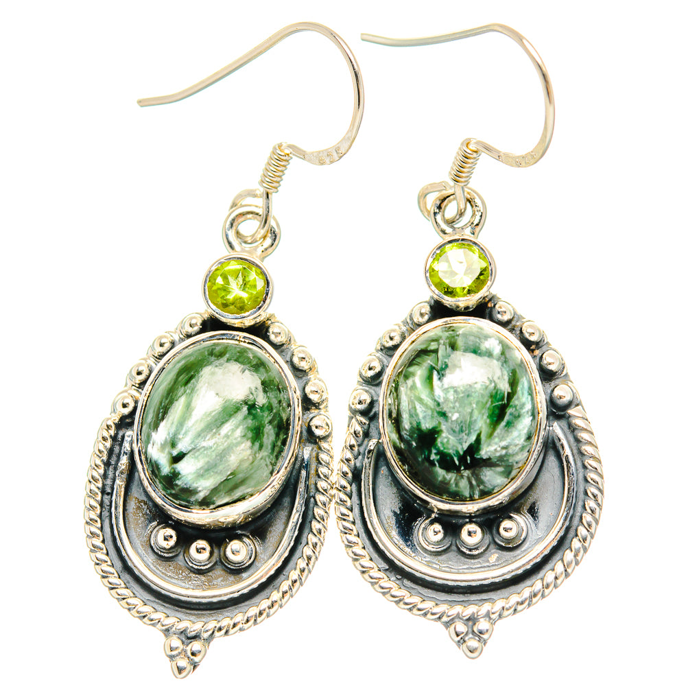 Sterling silver drop earrings with oval green gemstone, round peridot top, ornate silver frame