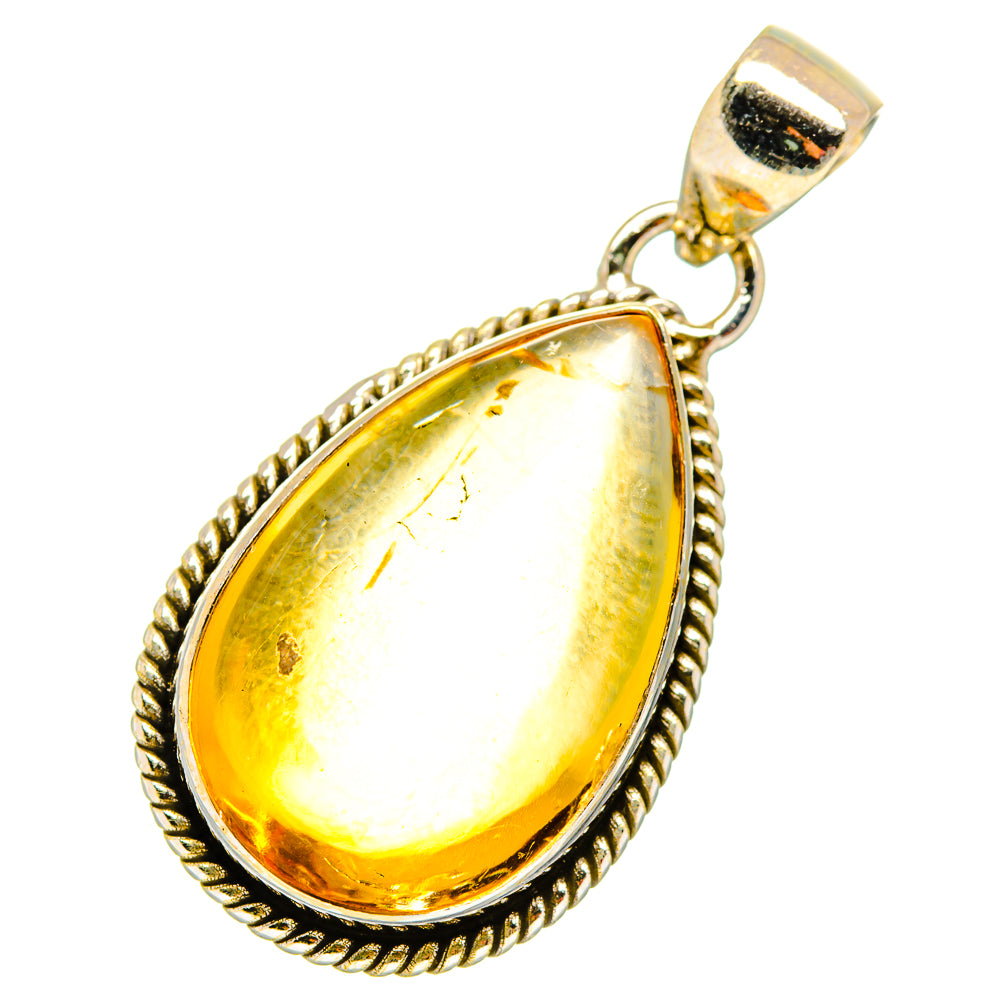 Sterling silver citrine teardrop pendant, reflective amber gemstone with rope border
