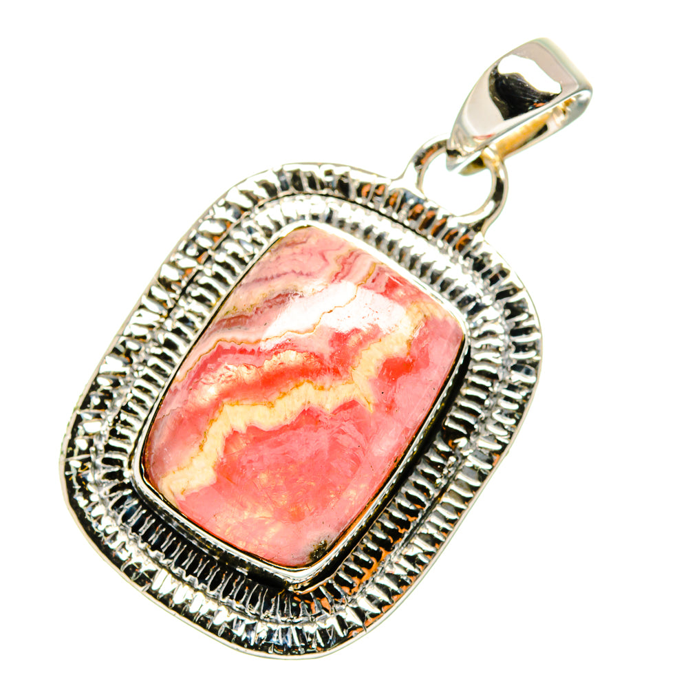 Sterling silver rhodochrosite pendant with pink marbled stone in oval textured frame.