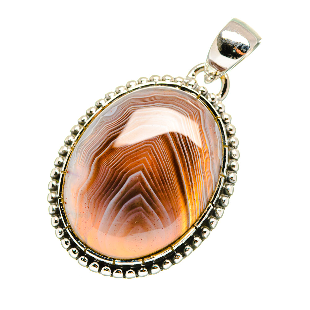 Sterling silver agate pendant with oval cabochon and beaded bezel, bail top
