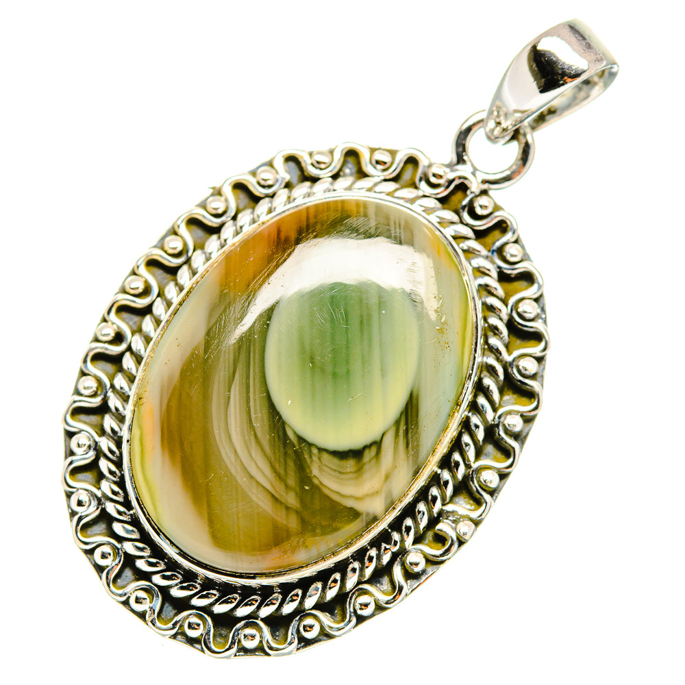Ornate sterling silver jasper pendant with oval green cabochon and top bail.