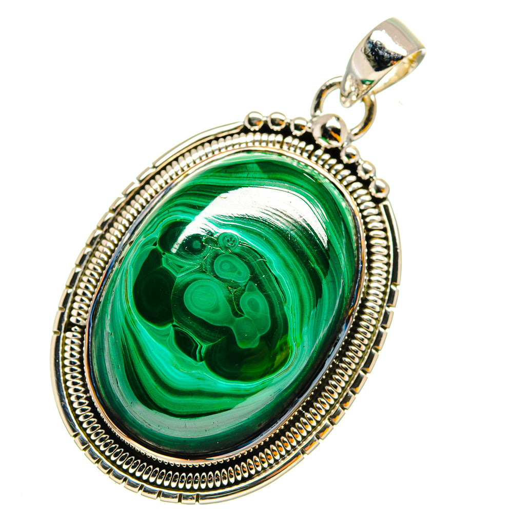 Oval malachite cabochon pendant in ornate 925 sterling silver bezel with bail