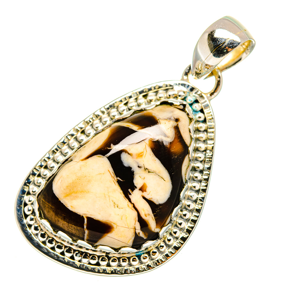 Sterling silver teardrop pendant with bezel-set jasper cabochon in black and cream.