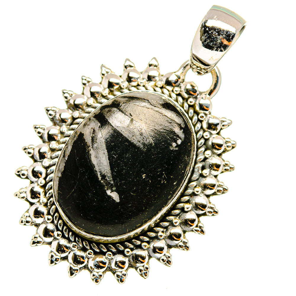 Sterling silver pendant top bail and round black cabochon with spiky floral frame