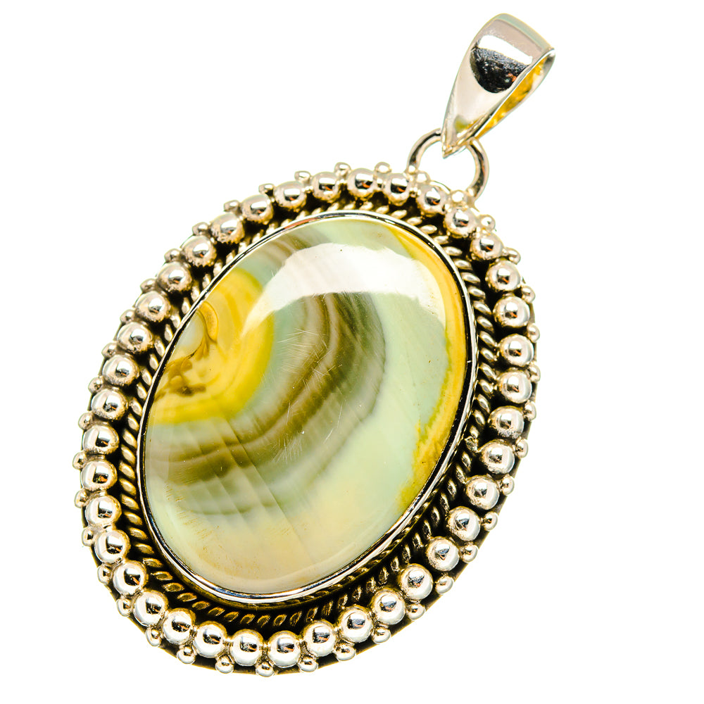 Oval yellow-green jasper pendant with double beaded silver rim and hanging bail