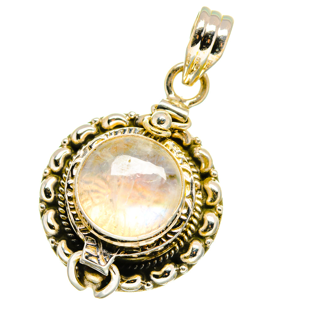 Moonstone poison pendant with round opalescent cabochon in ornate silver-toned setting