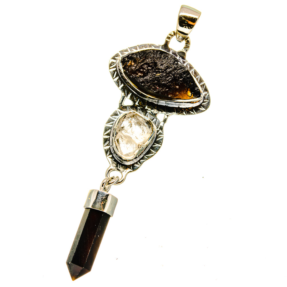 Sterling silver pendant with black teardrop center, clear bezel stone, black crystal tip
