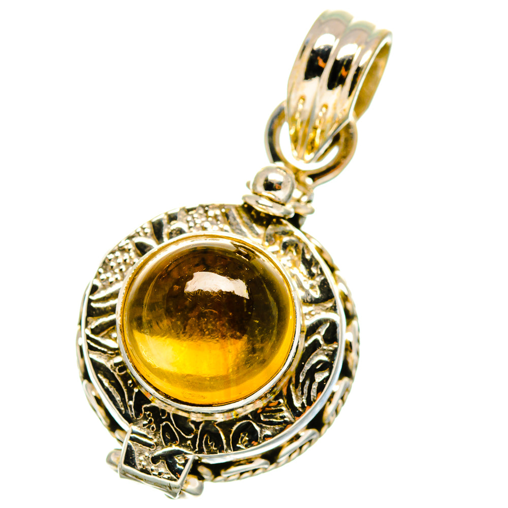 Sterling silver citrine pendant with round amber gemstone and ornate bezel