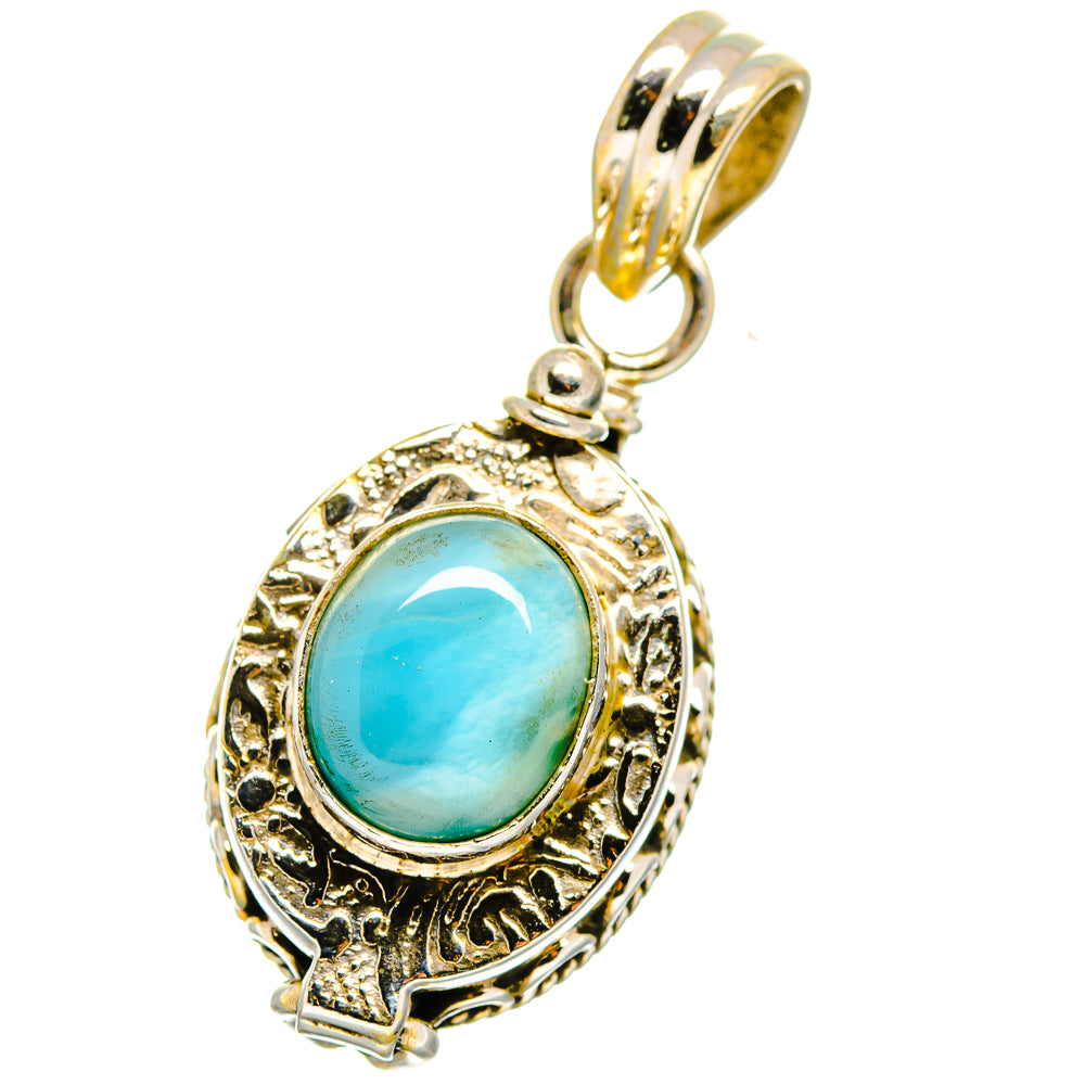 Sterling silver oval blue stone pendant with bail, filigree edging