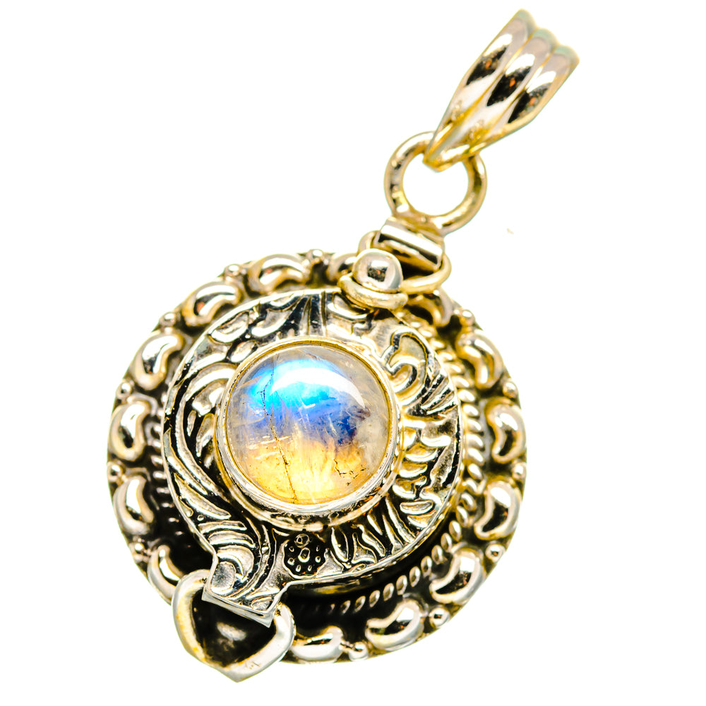 Round ornate silver pendant with prong-set rainbow moonstone cabochon and bail