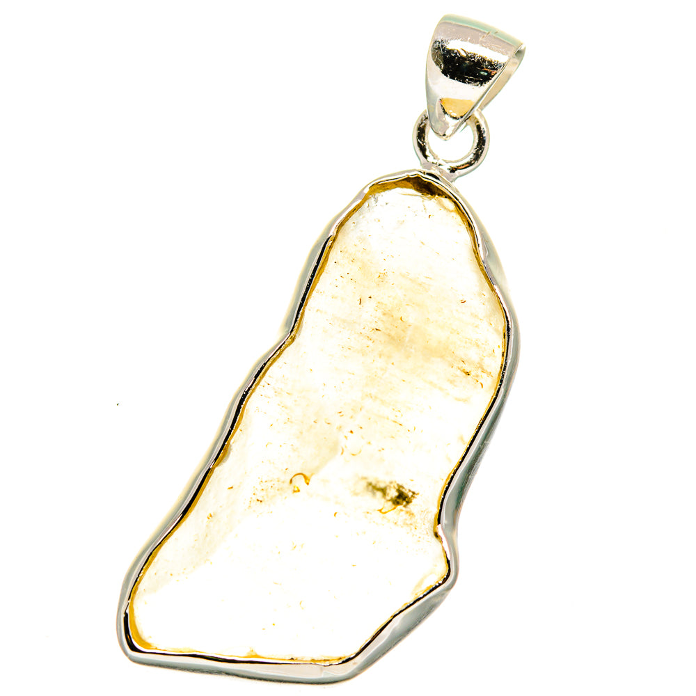 Pale yellow glass pendant in 925 sterling silver bezel, teardrop shape