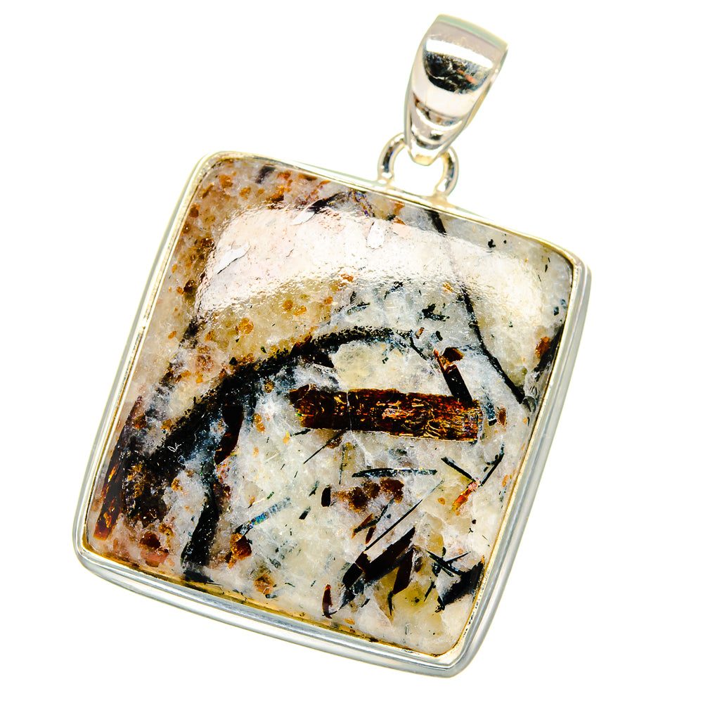 Square sterling silver pendant with white, black, and gold speckled gemstone.