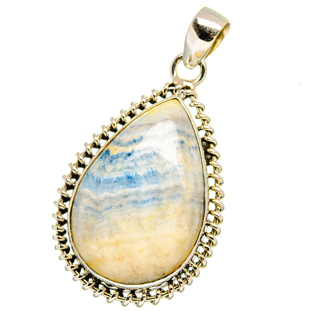 Teardrop blue scheelite pendant in 925 sterling silver with gold-tone frame