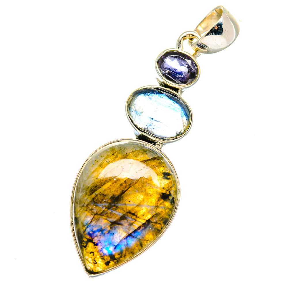 925 sterling silver gemstone pendant with teardrop center and oval blue cabochons, top loop