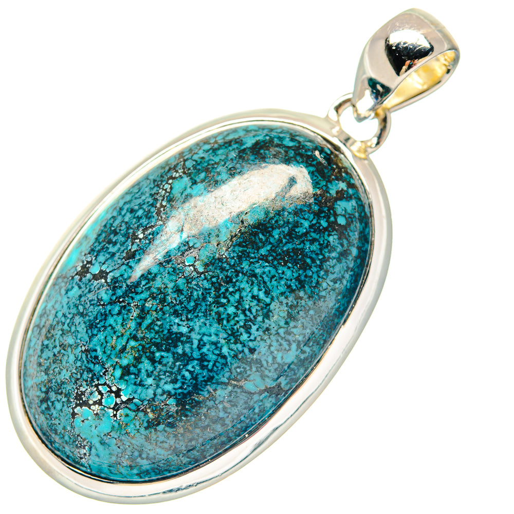 Oval turquoise cabochon pendant in silver-tone bezel with gold-tone bail, full view