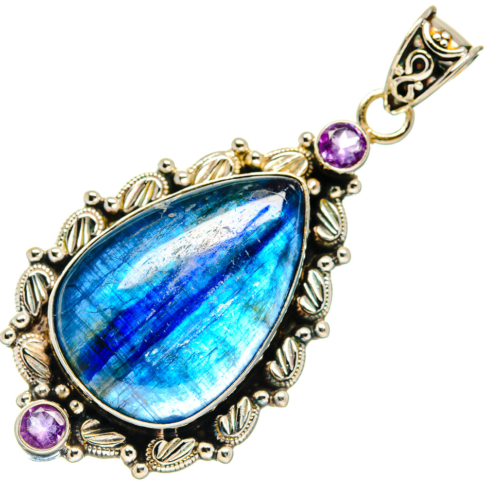Ornate teardrop kyanite pendant in gold-tone 925 silver with round amethyst accents
