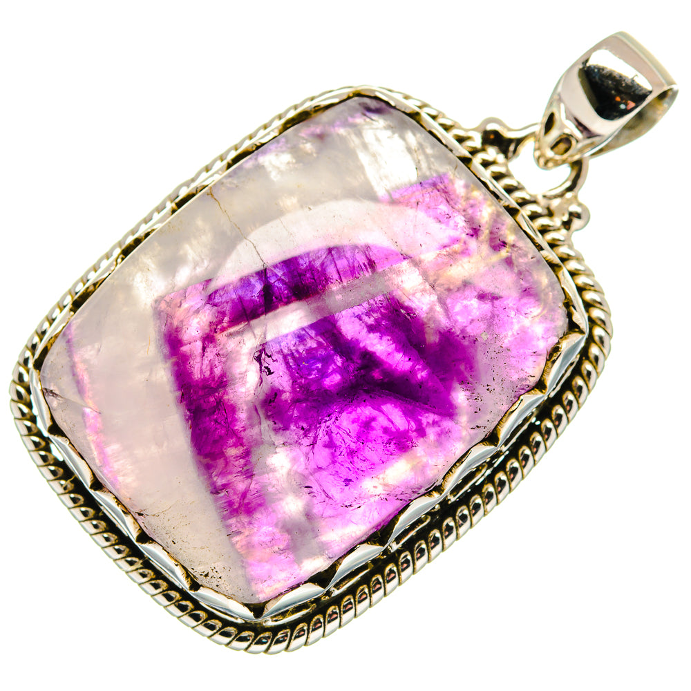 Amethyst pendant in 925 sterling silver bezel with purple gemstone cabochon