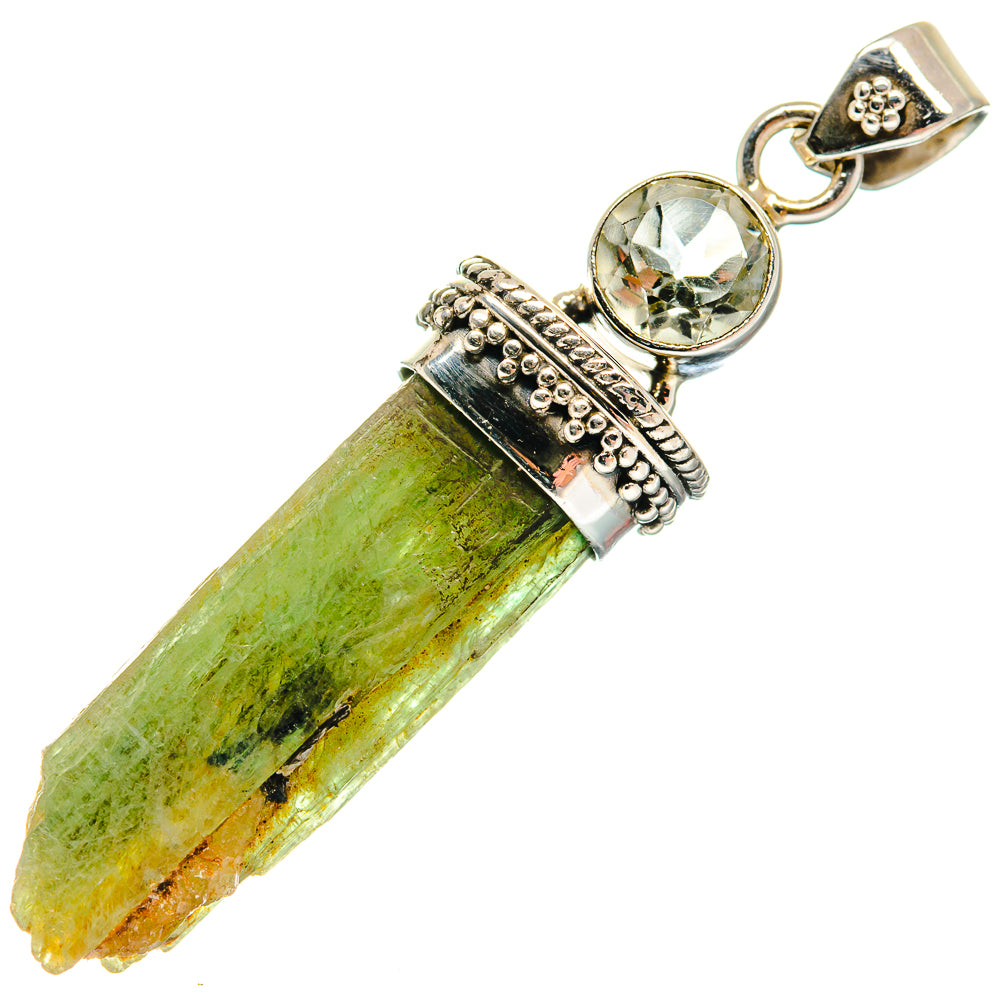 Sterling silver pendant with rough green crystal, round faceted green gemstone, bail