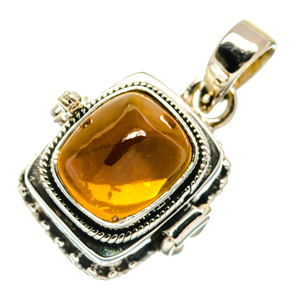 Sterling silver citrine pendant with square amber gemstone and raised decorative border