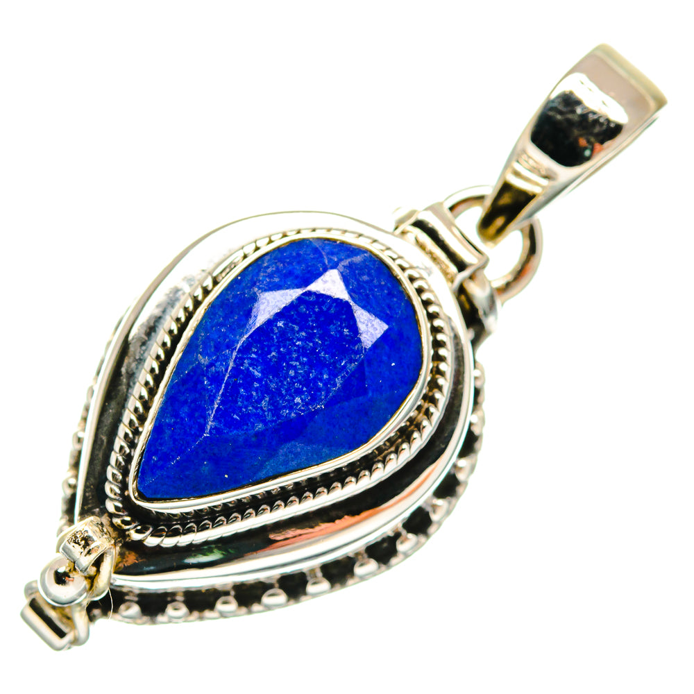 Sterling silver lapis lazuli pendant with teardrop blue stone, bail and loop clasp