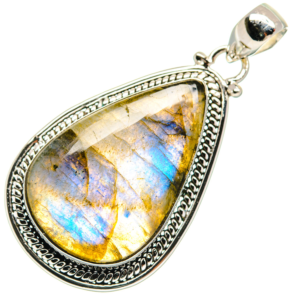 Labradorite teardrop pendant in 925 sterling silver with ornate frame and bail