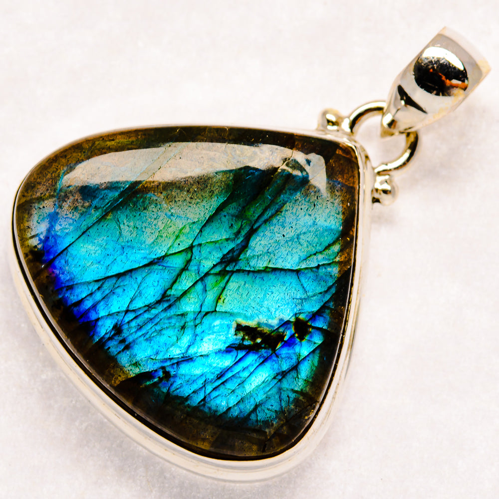 Sterling silver labradorite pendant with triangular teardrop cabochon, vivid blue iridescence