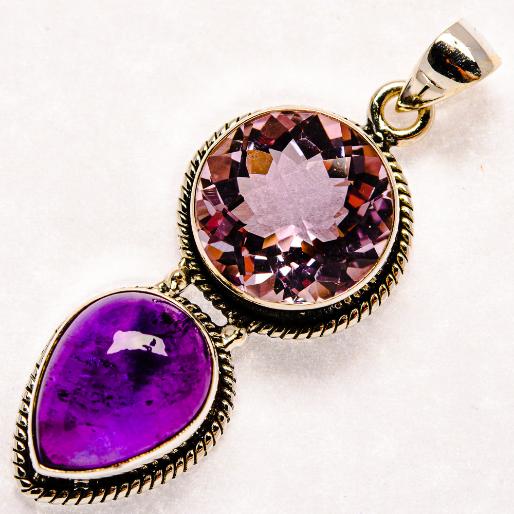 Sterling silver pendant with faceted round pink gemstone, purple teardrop, ornate bezel