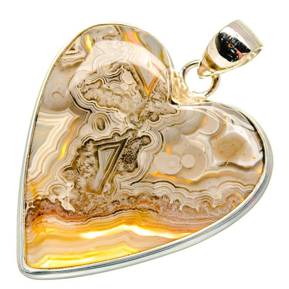 Heart-shaped lace agate pendant in sterling silver, gold-and-cream swirls with hanger bail