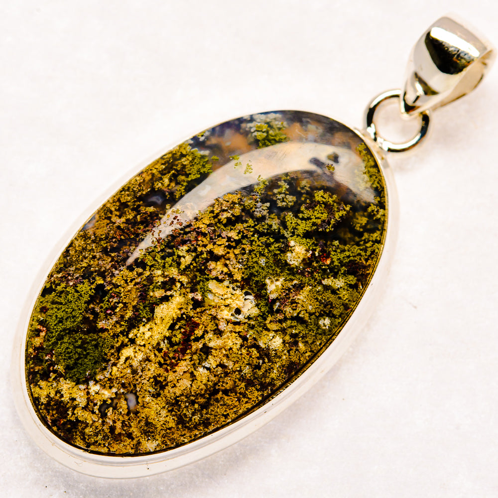 925 sterling silver plume agate pendant with teardrop cabochon, yellow-green speckled mineral design
