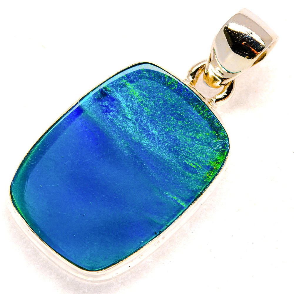 Sterling silver opal pendant with blue cushion center and loop bail