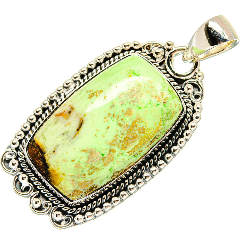 Sterling silver chrysoprase pendant with oval green-yellow stone and ornate bezel