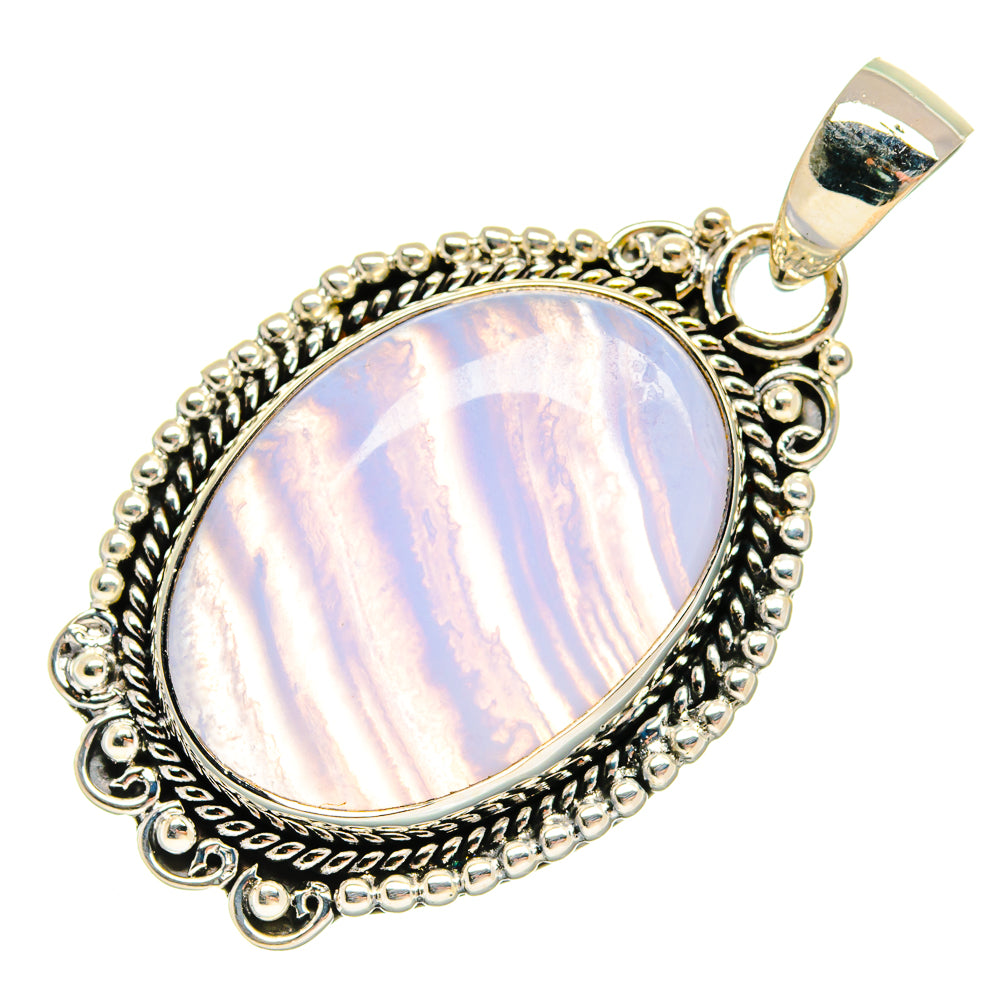 Oval blue lace agate pendant with silver filigree frame and attached bail