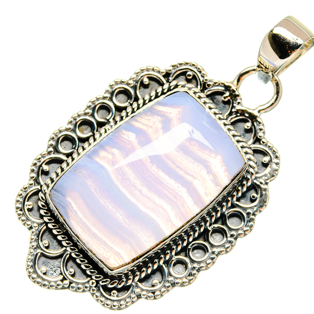 Rectangular blue lace agate pendant with scalloped silver filigree bezel and loop bail
