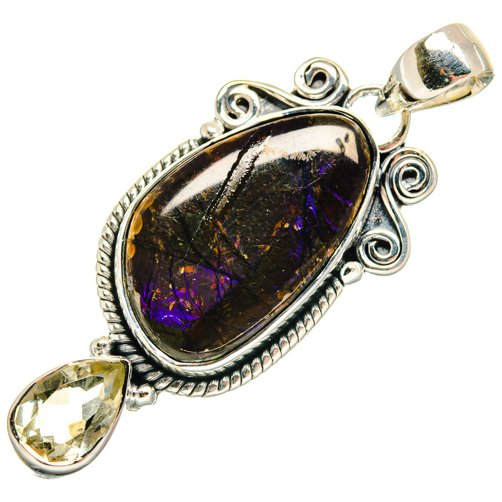Sterling silver pendant with oval black gemstone, purple shimmer, and teardrop yellow side stone