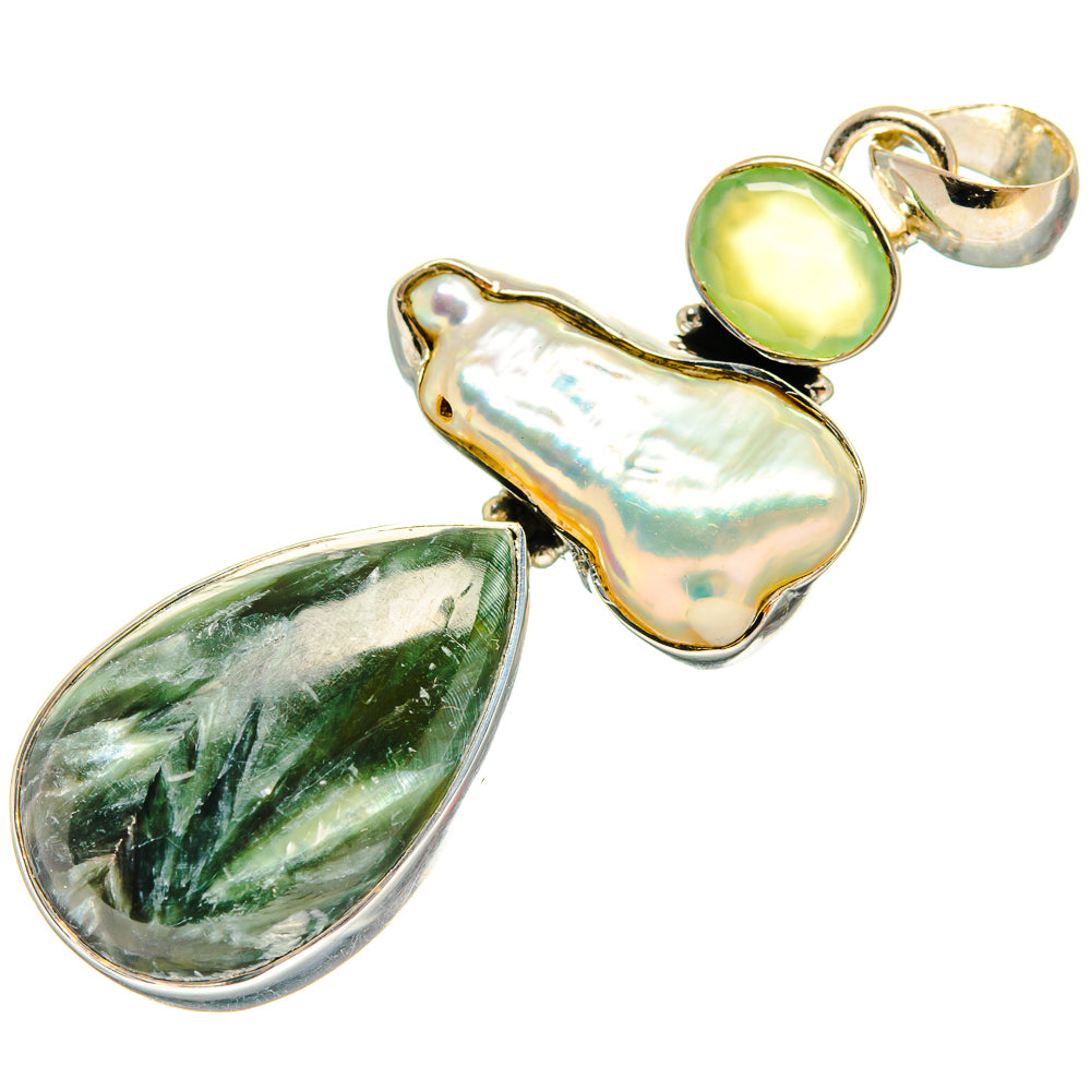 Sterling silver pendant with iridescent mother-of-pearl and green teardrop stones