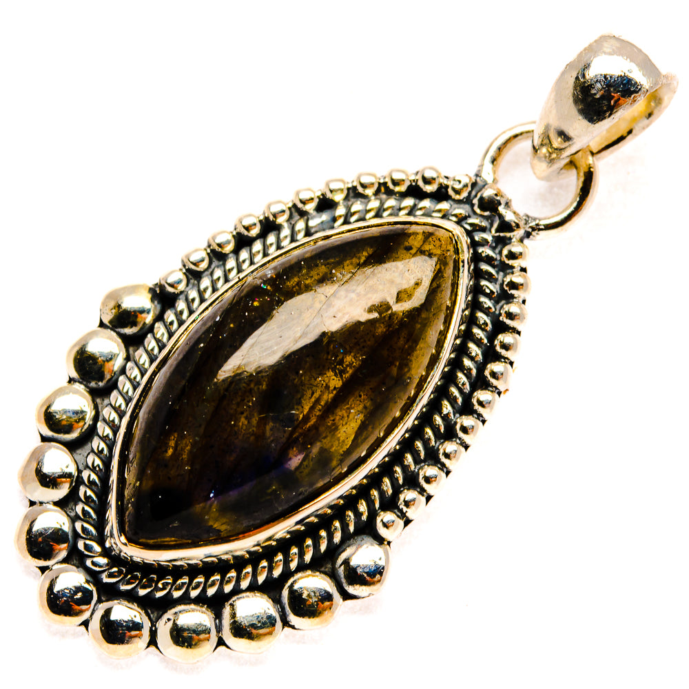 Oval labradorite pendant with dark green-gold stone, textured silver bezel and top bail