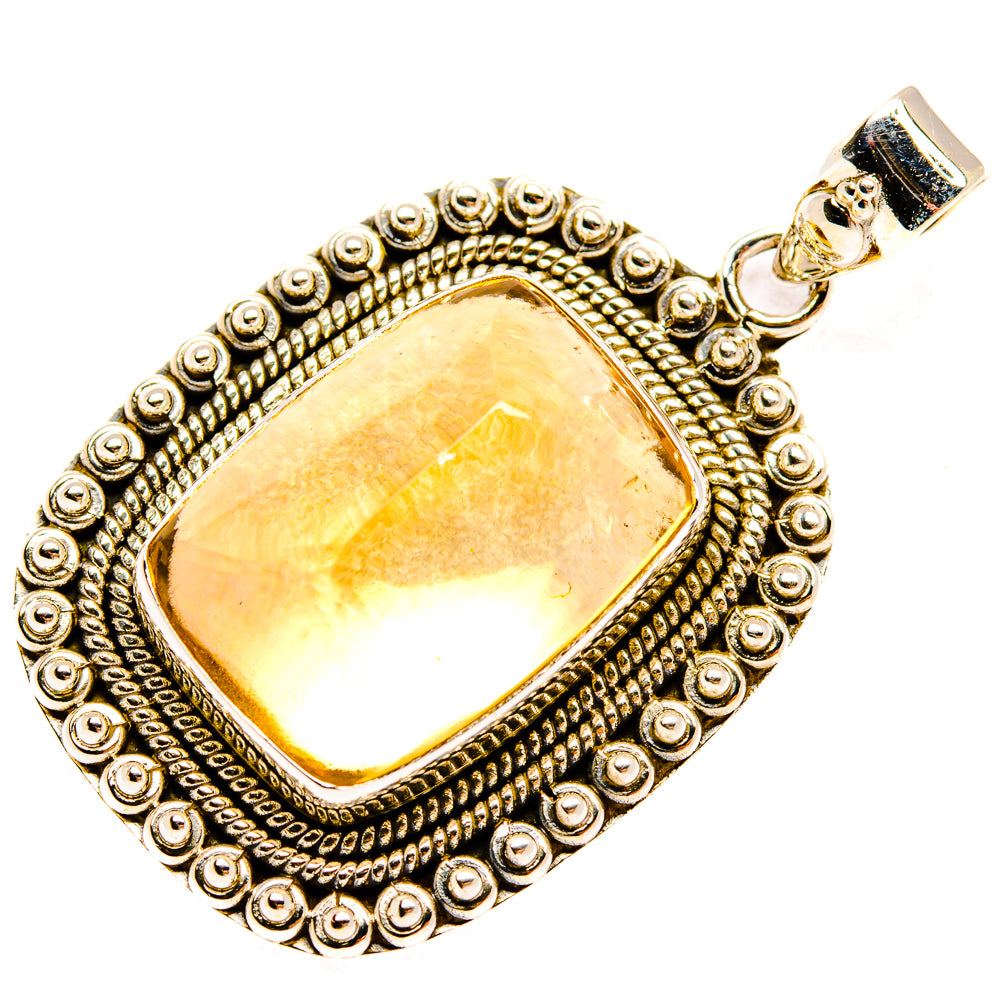 Sterling silver sugarloaf citrine pendant with ornate rope frame and bail