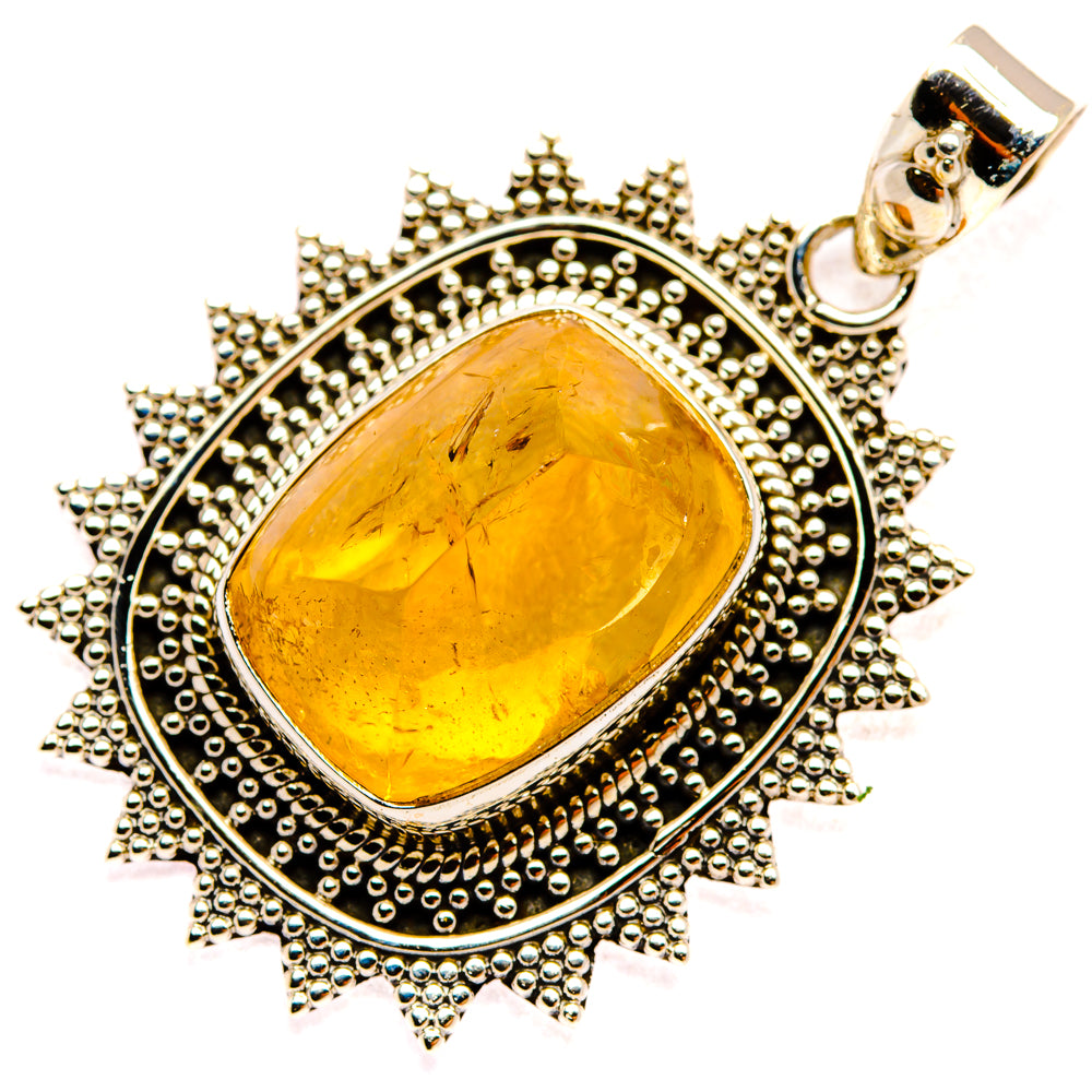 Sterling silver citrine sugarloaf pendant with ornate beaded sunburst frame