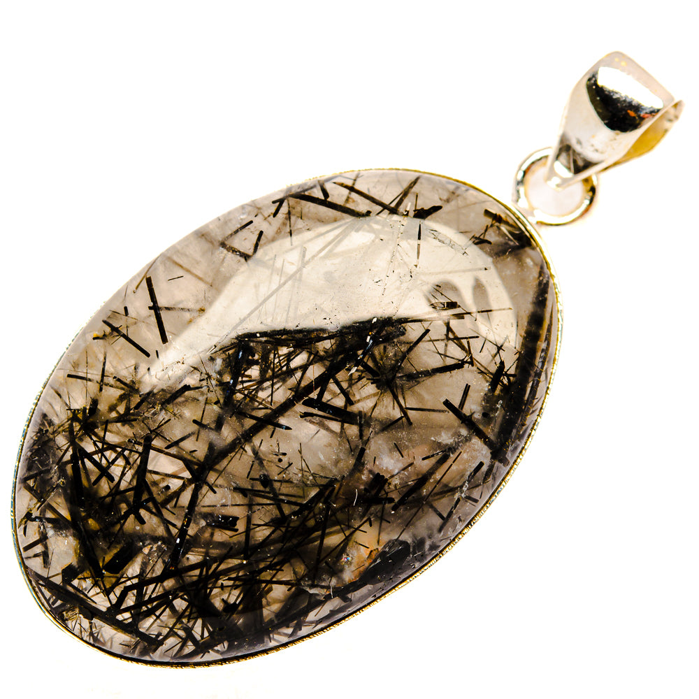 Sterling silver pendant with oval tourmalinated quartz, black needle inclusions.