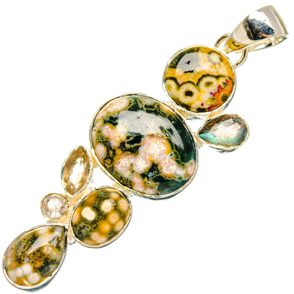Oval gemstone pendant in sterling silver, with green and yellow cabochons and top loop