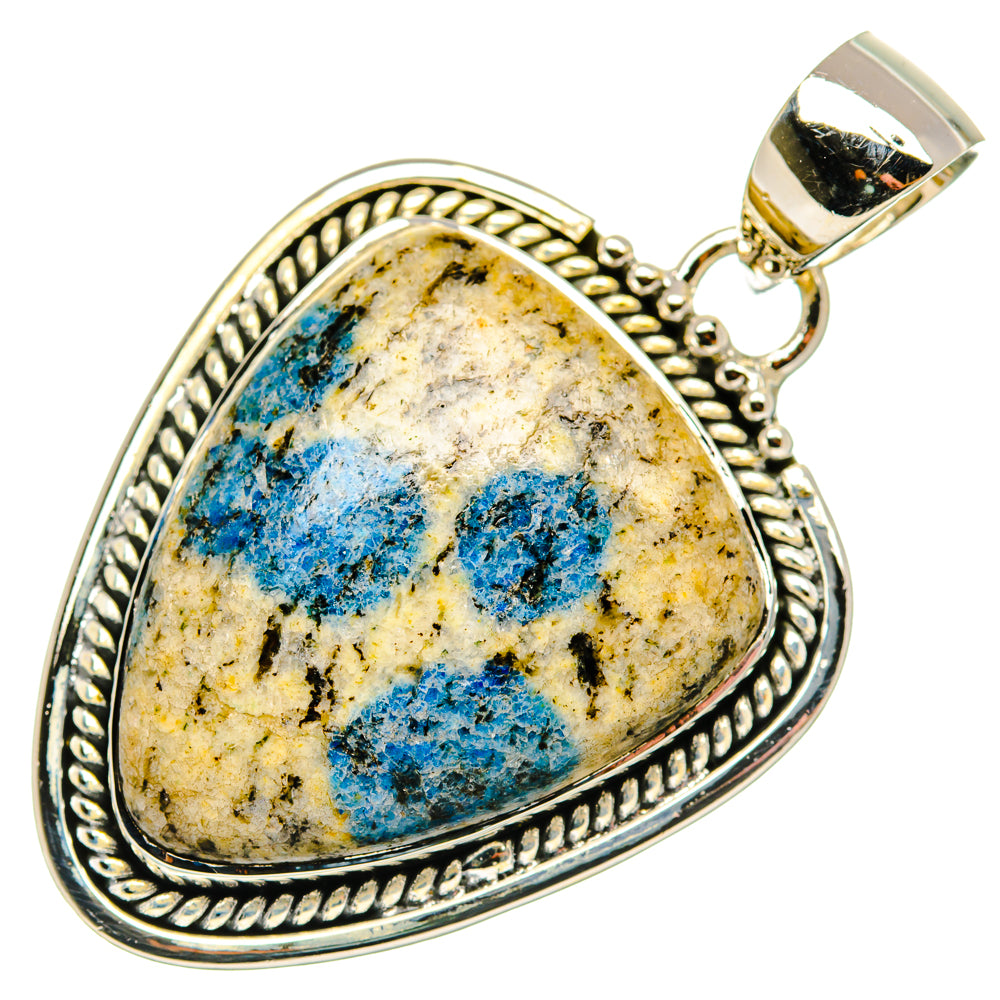 Sterling silver teardrop pendant with azurite cabochon and polished bail, rope bezel