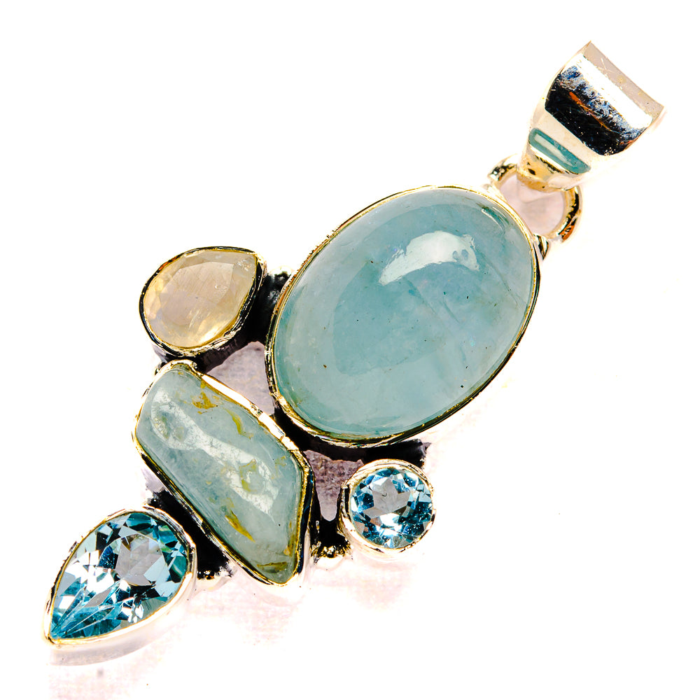 Oval aquamarine-blue pendant with teardrop and round blue stones in sterling silver